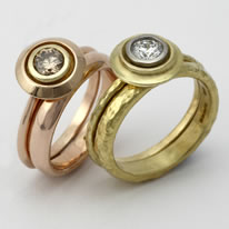 Engagement Rings with concentric sloped setting with diamonds